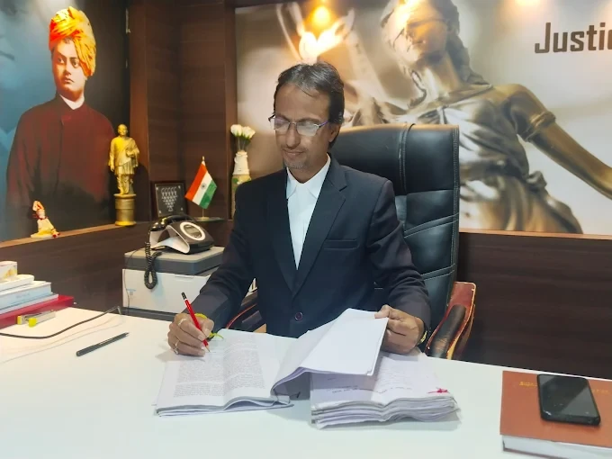 Advocate Indrajit Dongre at his desk in the Kasba Peth office, Pune