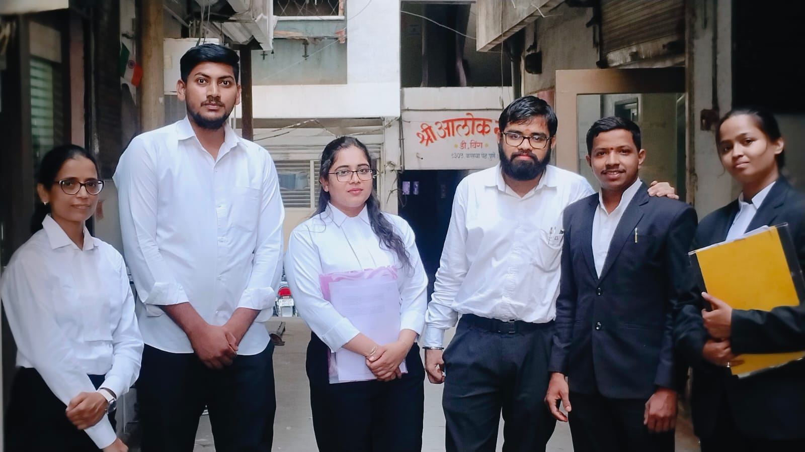 Indrajit Dongre & Associates legal team outside the office in Kasba Peth, Pune